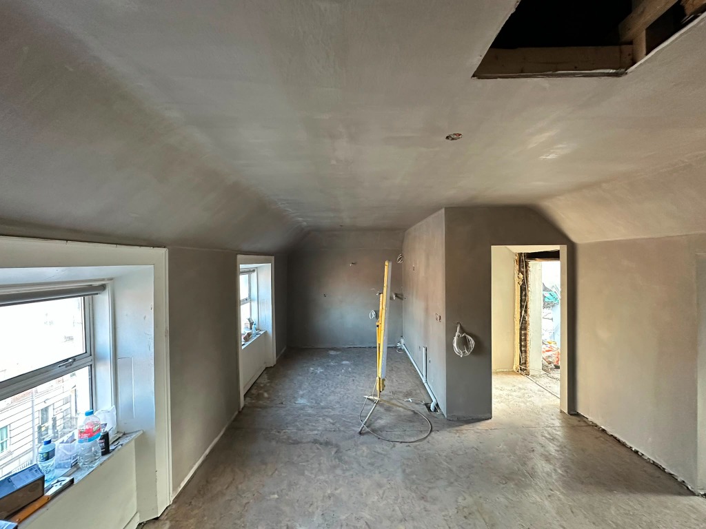 Finished large attic conversion plastering and skimming